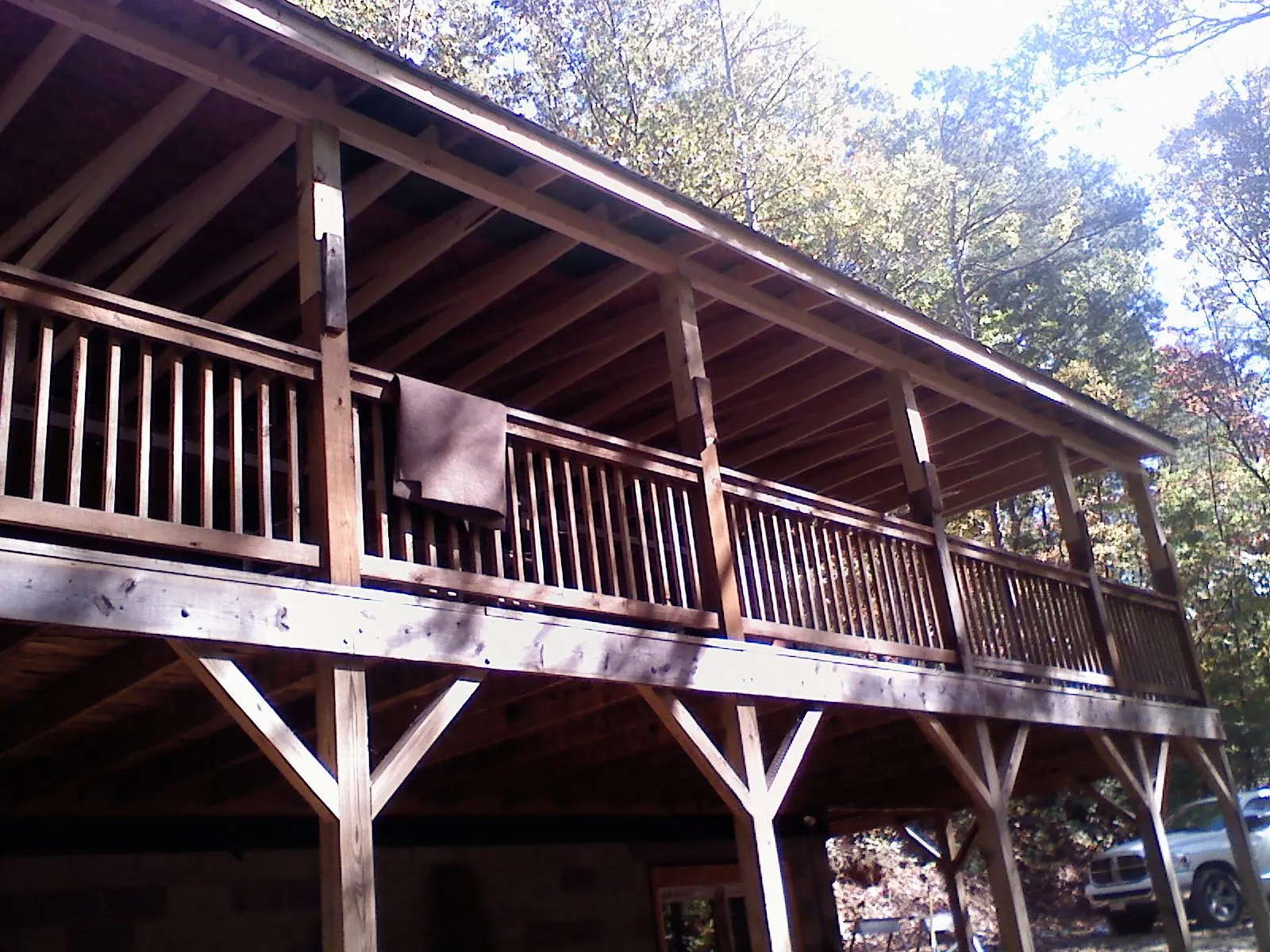 Timber framing under a new elevated porch and deck — Roof Leak Repair in Meadow by Roofing Brothers